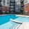 Pool area near apartment complex