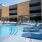 Pool with reclining chairs in the water