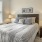 Bedroom with natural lighting and high ceilings
