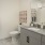 Spacious bathroom with ample lighting